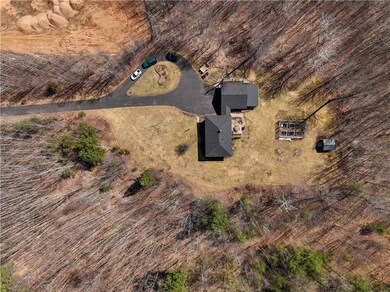 Property sits on 4.25 acres tucked off the hwy yet