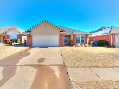 Ranch-style home with an attached garage, a shingl