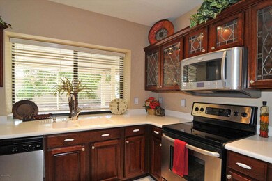 Beautiful Glass-Front Cherry Cabinets
