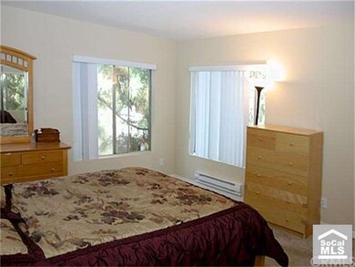The two windows in the main bedroom allow plenty o