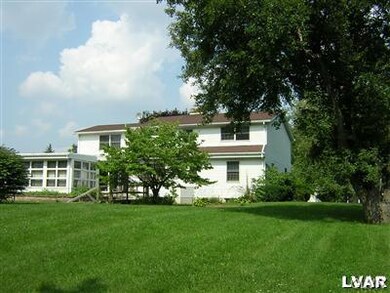 Rear view of house, showing Florida room extention