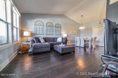 Vaulted ceiling & beautiful hardwoods