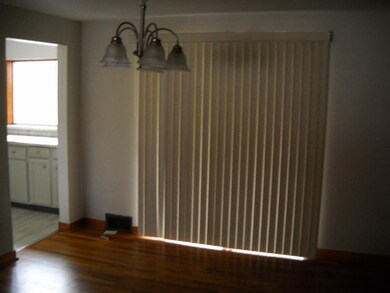 Dining Room with Sliding Doors to Back Porch and Y