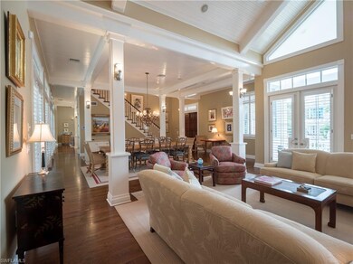 Great room with seating, dining and welcoming entr