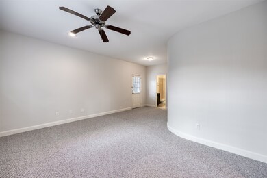 The room features ample storage space, new berber