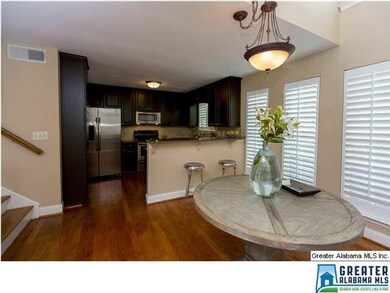Dining Room with Hardwoods and Plantation Shutters