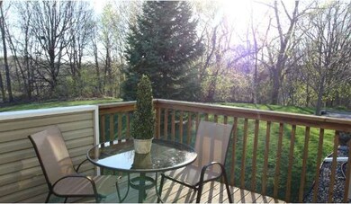 Enjoy private setting and views of wooded area and