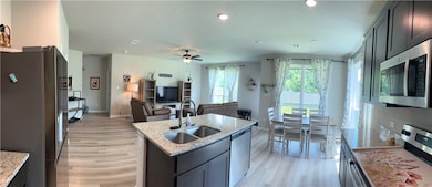 Kitchen featuring appliances with stainless steel