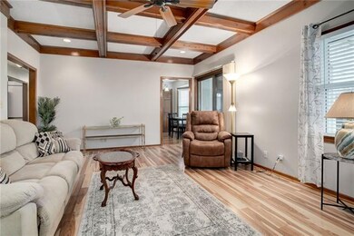 A sliding door leads to the light filled sun room.