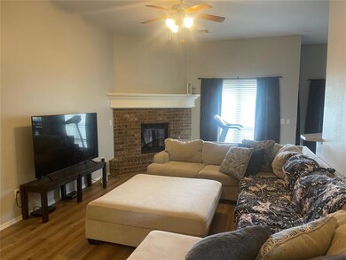 Living room featuring hardwood / wood-style floors