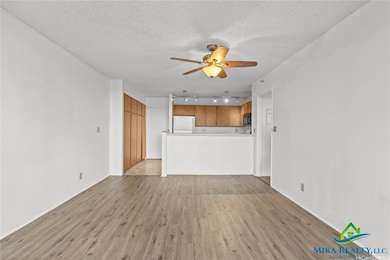Living Area view from window facing kitchen area *Enhanced Photo