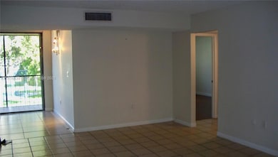 going into kitchen, hallway on right to 2 of the bedrooms