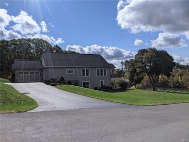 Spacious lot with all around views of the Oswego R
