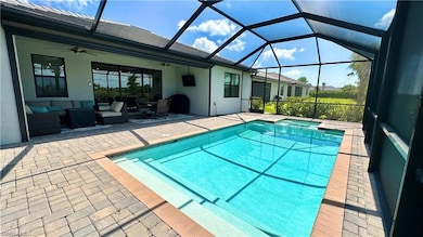 View of pool featuring a patio, a lanai, an outdoo