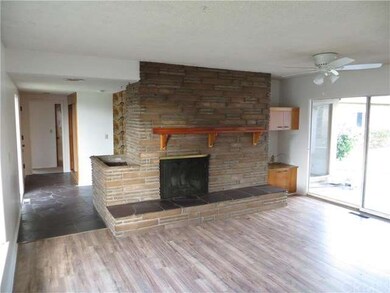The Large open plan family room with one of the tw