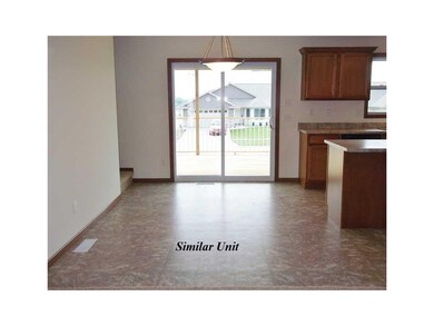 Dining Area. Picture is of Similar Unit.