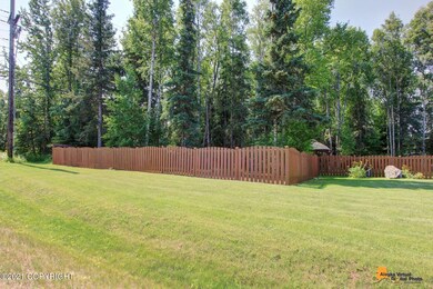Large fenced south side yard