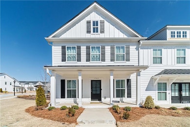 View of front of property featuring covered porch 