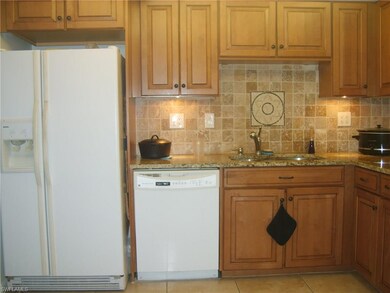 BEAUTIFUL CABINETS AND BACK SPLASH IN THIS UPDATED