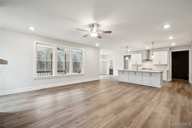 The light-filled family room boasts a gas fireplac