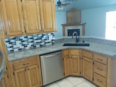 Black sink and rub bronze faucet.