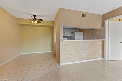 Unfurnished room featuring tile patterned floors, 