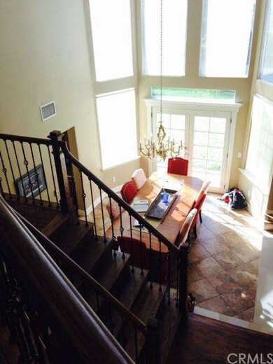 Formal sunken dining room open to living room with