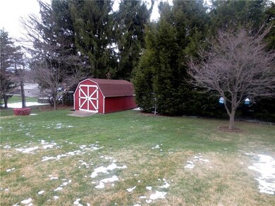 Shed out back with concrete floor and easy access 