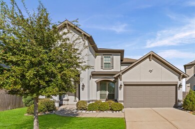 Architectural design includes a prominent arched window and decorative lighting.