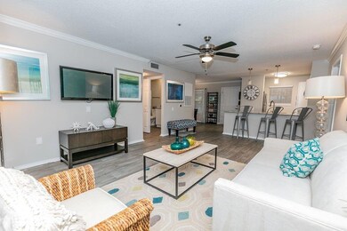 Living room featuring wood-type flooring, ceiling 
