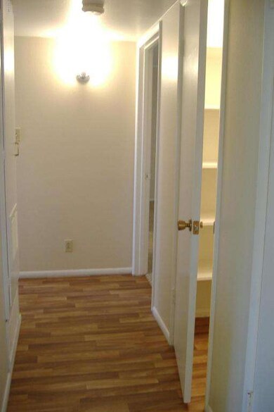 HALLWAY WITH TWO CLOSETS