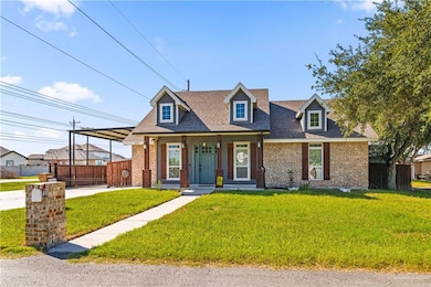 Cape cod house with a porch, brick siding, and roof with shingles