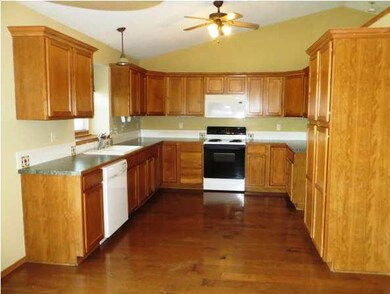 Kitchen with wood flooring