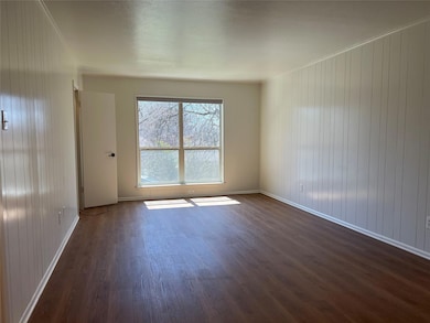 This is a bright and airy living room, featuring a