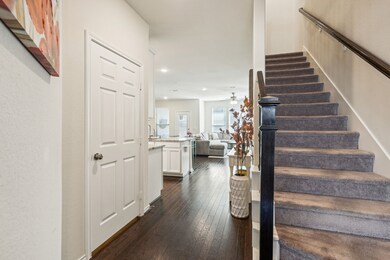 Step into this large and welcoming entry, to find