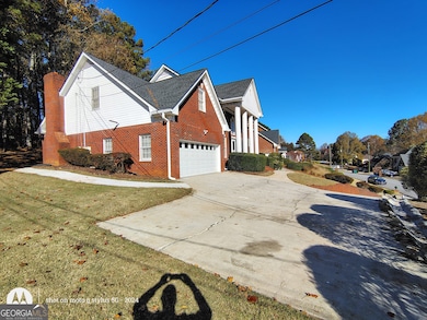 5121 Huntshire Ln SW, Lilburn, GA 30047 - photo 2