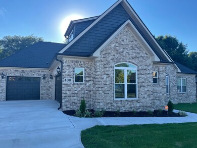 3 Car Attached Garage w/Storage Room