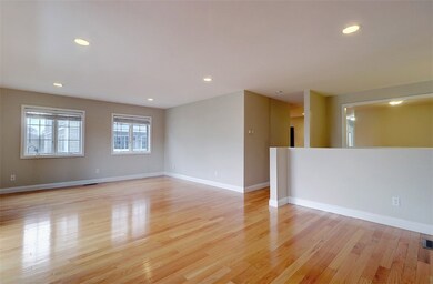 Sunfilled, Spacious Living Room Open to Dining Are