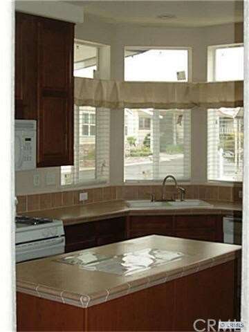 Kitchen with solid surface countertops