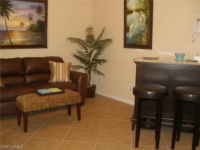 The formal dining room is being used as an entertaining area.