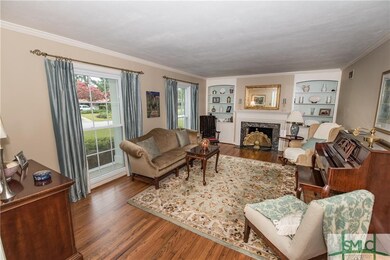 Living Room with gorgeous hardwood floors, gas fir