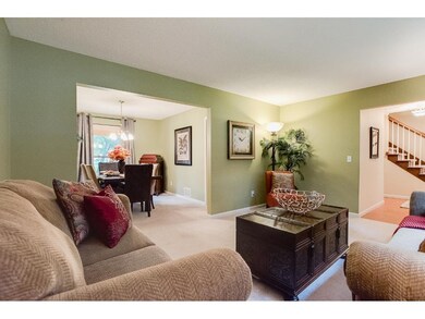 The main level living room is spacious and open to