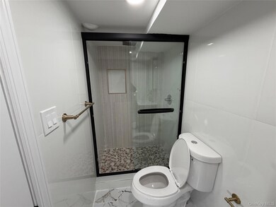 Bathroom with a shower stall
