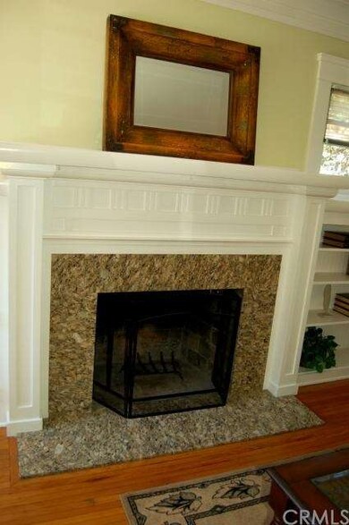 Elegant granite accent to a masterpiece fireplace!