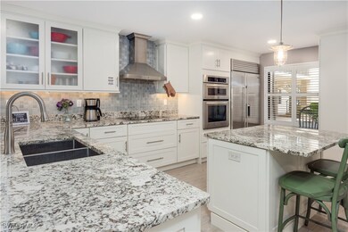 Kitchen with appliances with stainless steel finis