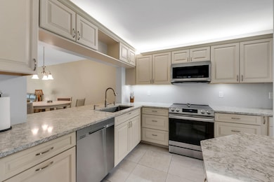 236 Pebble Beach Cir unit 102, Naples, FL 34113 - photo 3