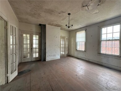 Spare room featuring hardwood / wood-style floorin