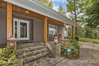 private covered front porch, main entrance.