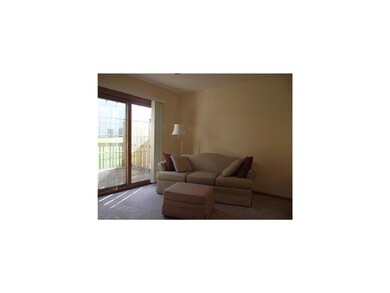 Living Room. Living room with slider to deck makes