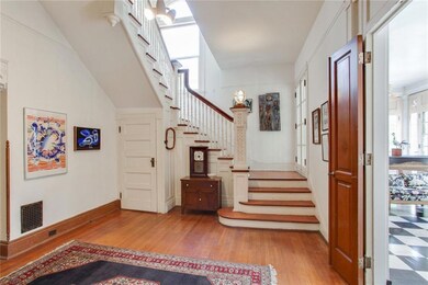Foyer with view into sunroom.